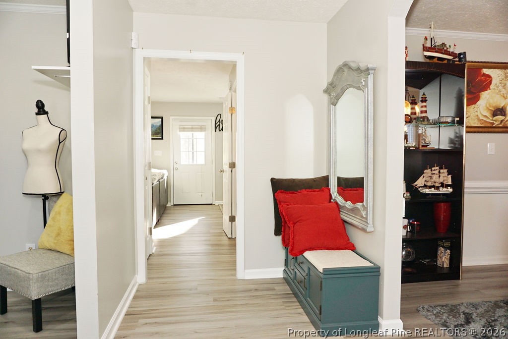 8363 King Road Fayetteville, NC 28306 - Photo 3 of 44 a living room with furniture and a wooden floor