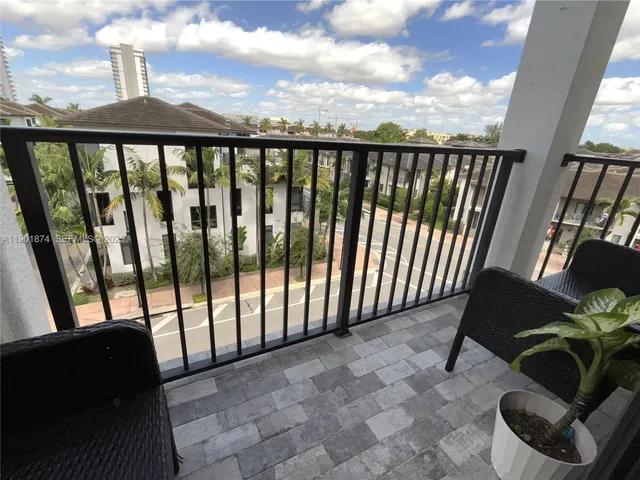a view of a balcony with outdoor space