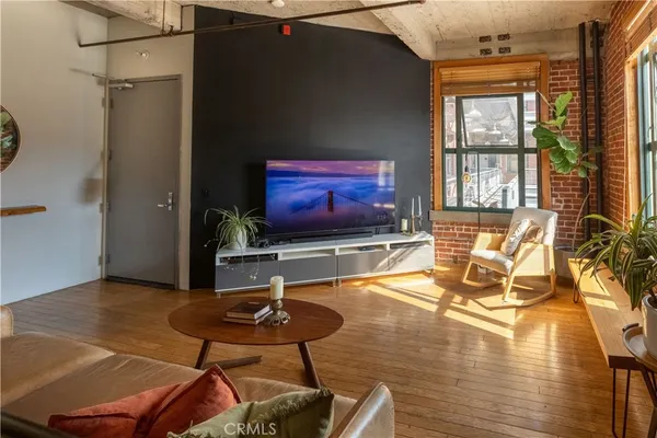 a view of balcony with furniture