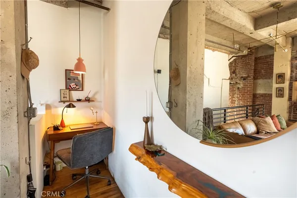 a kitchen with a stove and a refrigerator