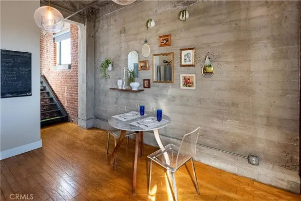 a bedroom with a bed and a table