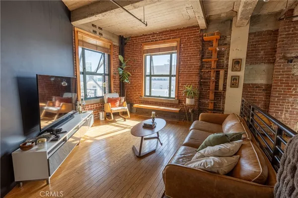 a kitchen with stainless steel appliances a refrigerator sink and cabinets