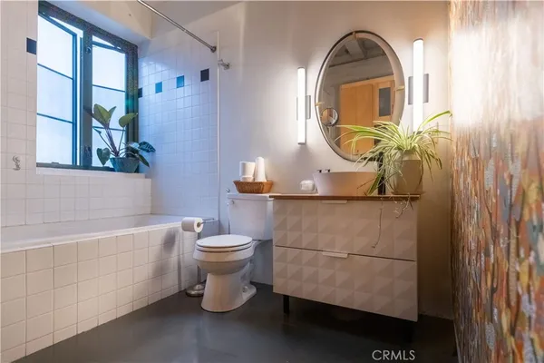 a view of city with tall buildings