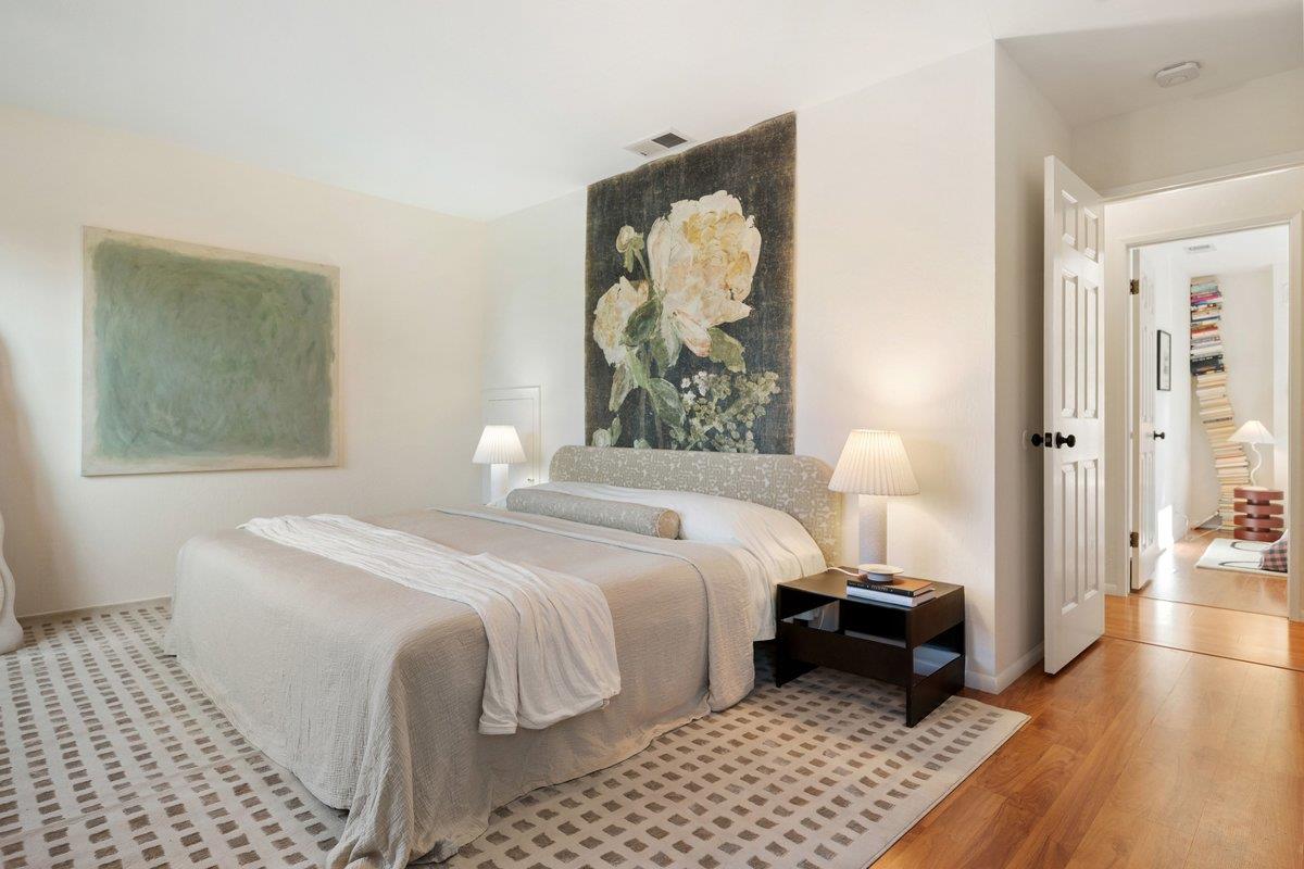 769 Jackson Street Santa Clara, CA 95050 - Photo 18 of 40 a bedroom with a bed and a painting on the wall