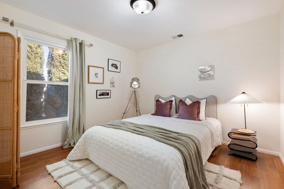 769 Jackson Street Santa Clara, CA 95050 - Photo 21 of 40 a bedroom with a bed and a window