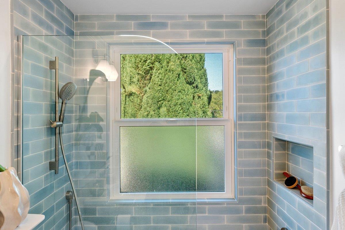 769 Jackson Street Santa Clara, CA 95050 - Photo 24 of 40 a bathroom with a glass shower door