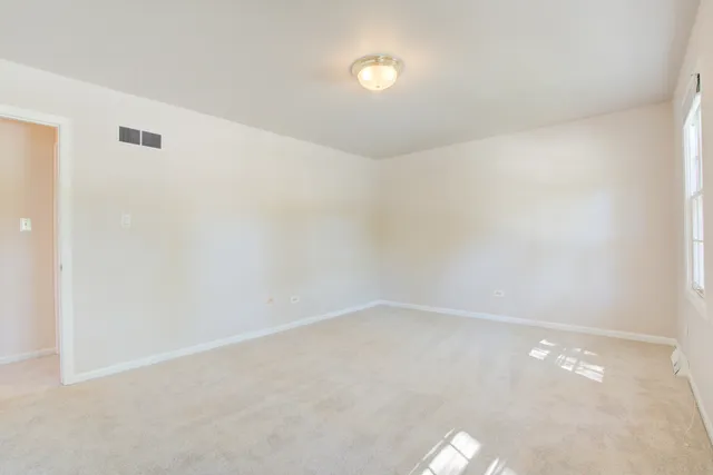 a bathroom with a sink a mirror and a shower