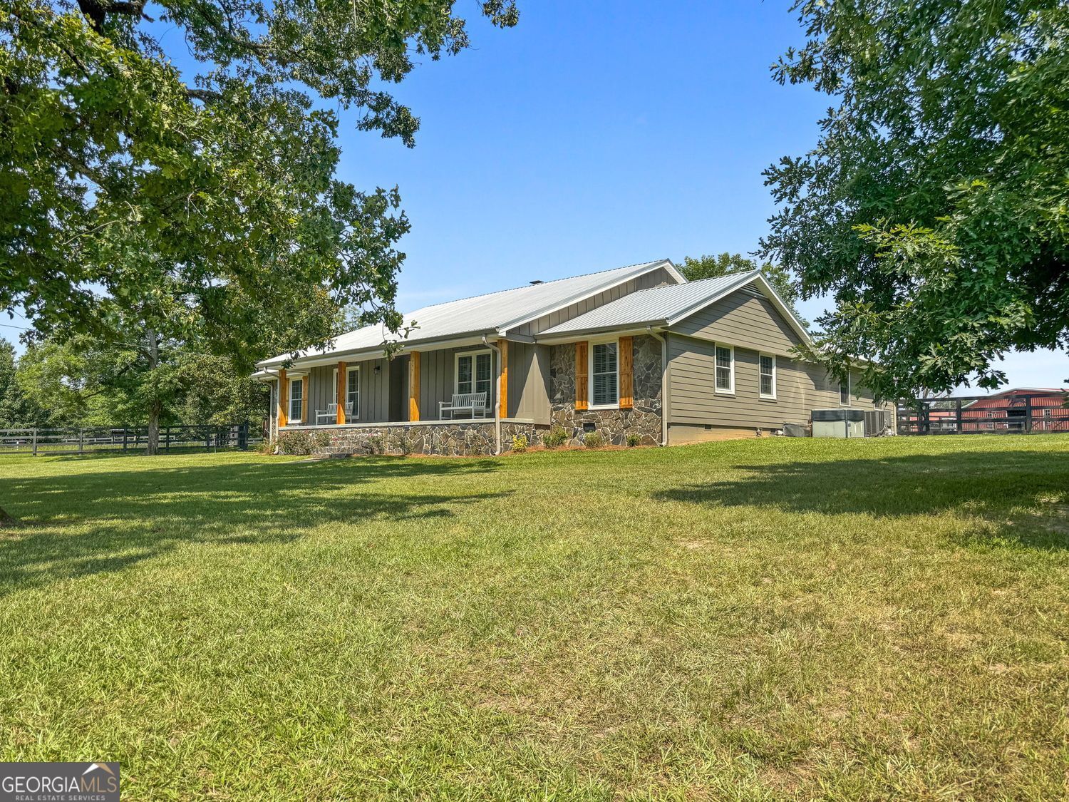 8272 Old Zebulon Road Molena, GA 30258 - Photo 29 of 53 a front view of a house with a garden