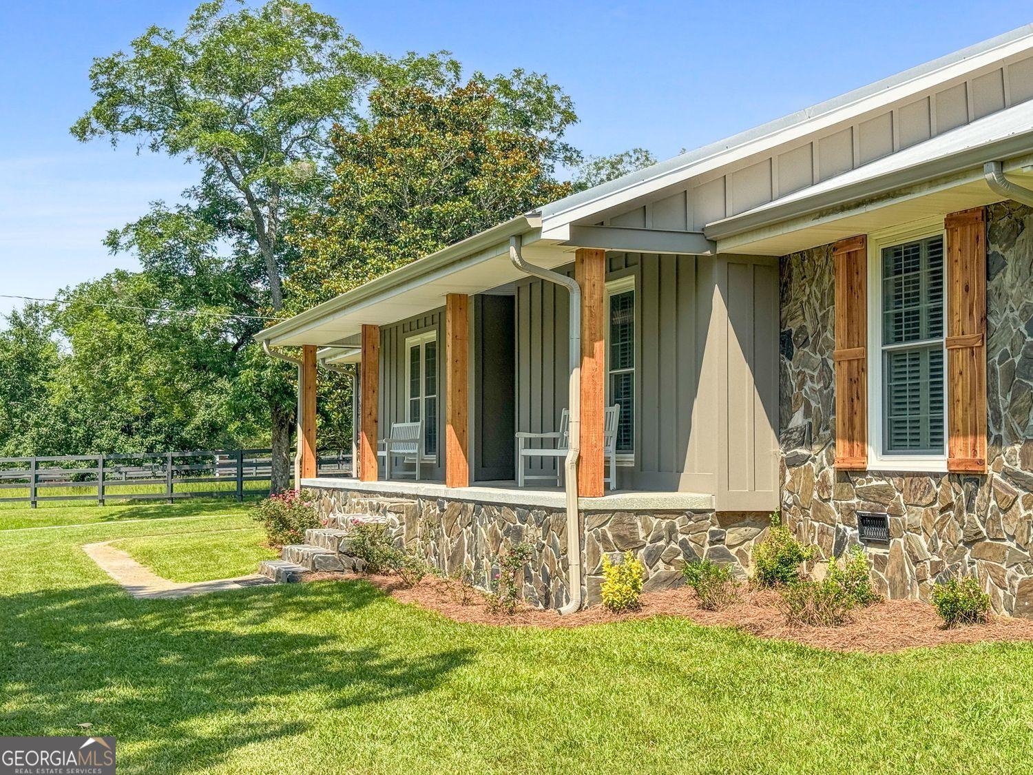 8272 Old Zebulon Road Molena, GA 30258 - Photo 30 of 53 front view of a house with a yard