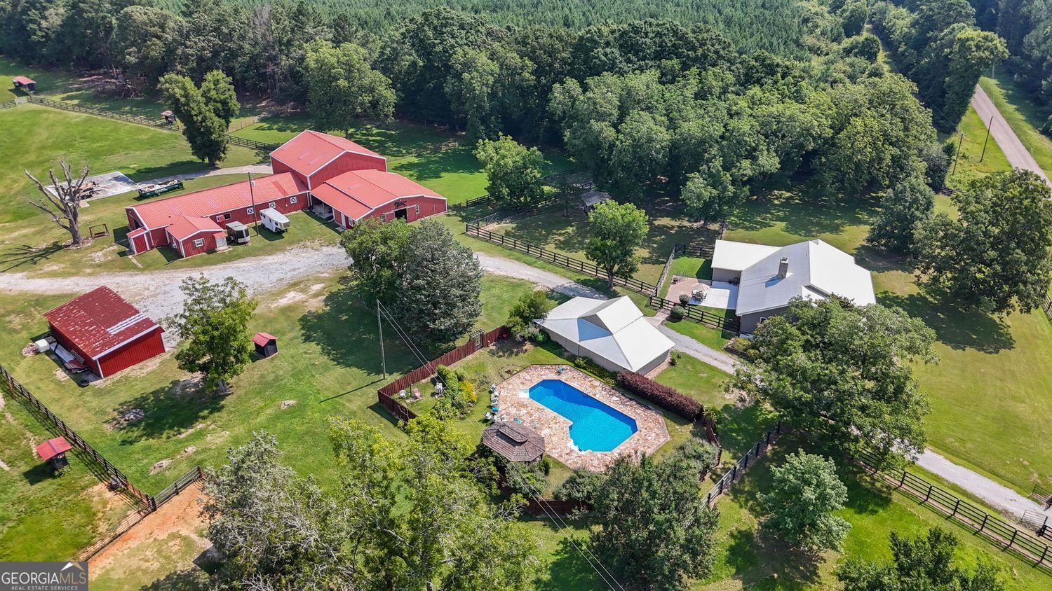 8272 Old Zebulon Road Molena, GA 30258 - Photo 4 of 53 an aerial view of a house with an outdoor space