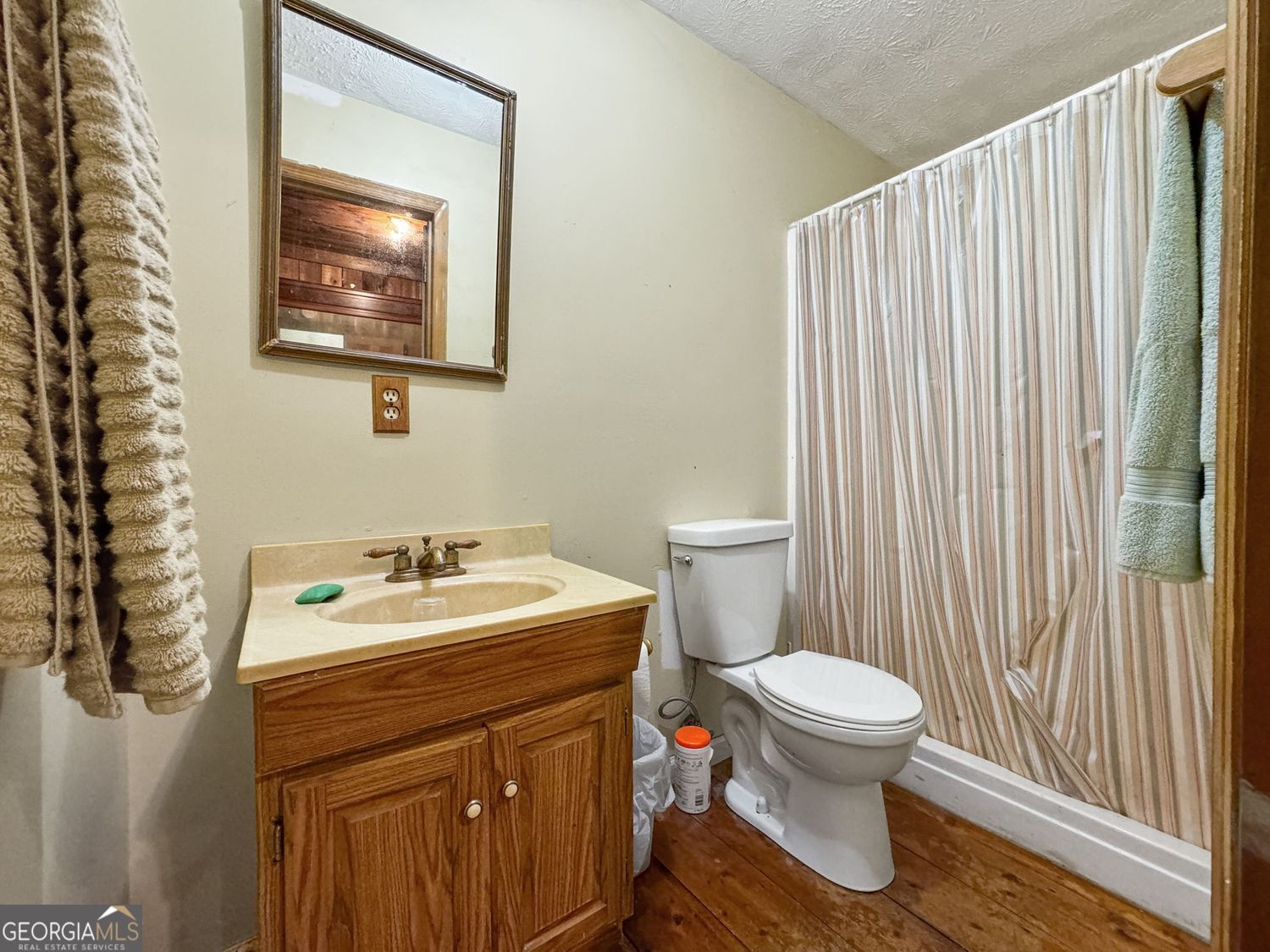 8272 Old Zebulon Road Molena, GA 30258 - Photo 41 of 53 a bathroom with a sink toilet and shower