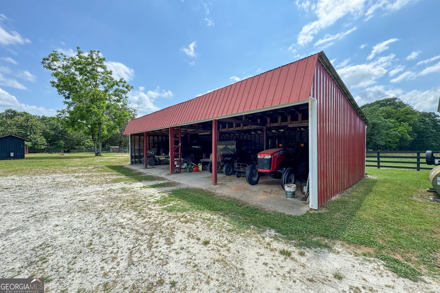 8272 Old Zebulon Road Molena, GA 30258 - Photo 48 of 53 a view of a house with backyard and sitting area