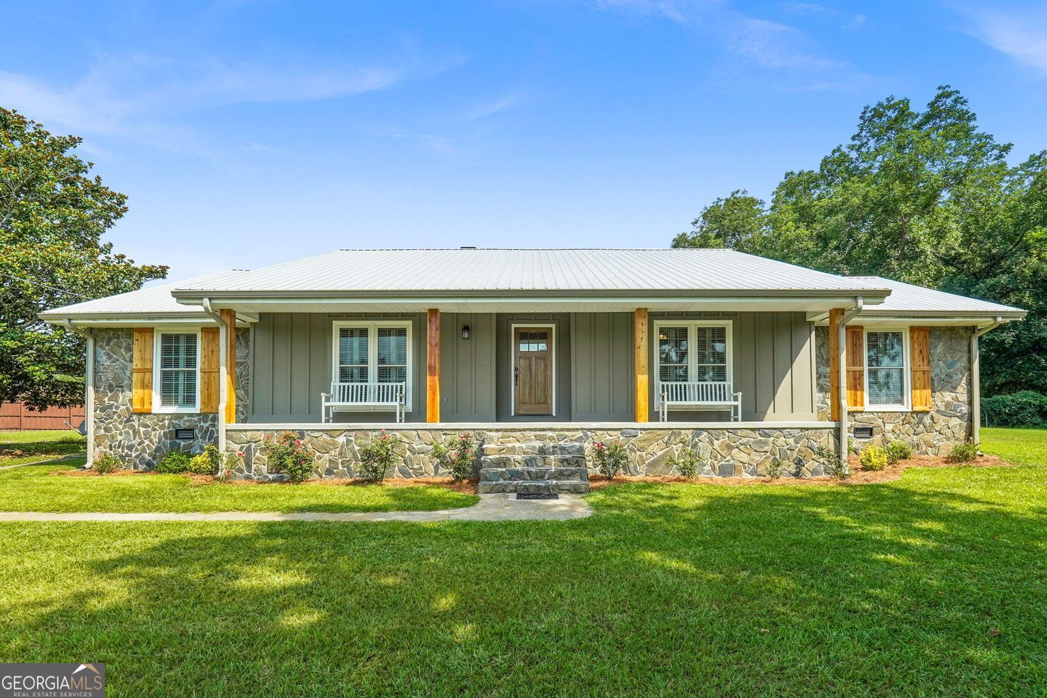 8272 Old Zebulon Road Molena, GA 30258 - Photo 8 of 53 front view of a house with a yard