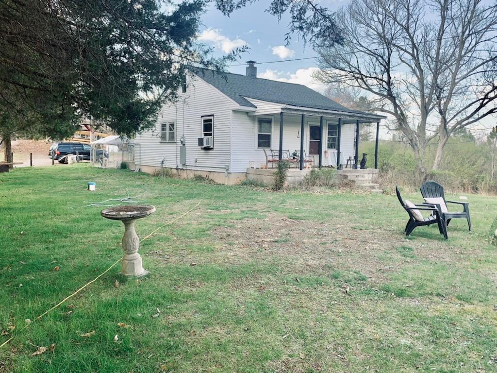 a house view with a garden space