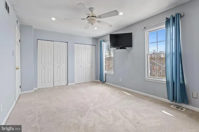 a view of a livingroom with a flat screen tv