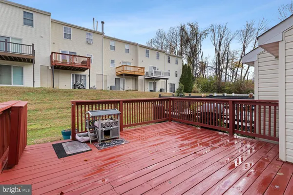 a roof deck view with a seating space