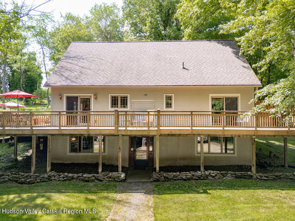 53 Snyder Pond Road Copake, NY 12516 - Photo 28 of 47 a aerial view of a house with a swimming pool
