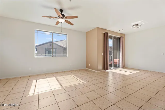 a view of an empty room and window