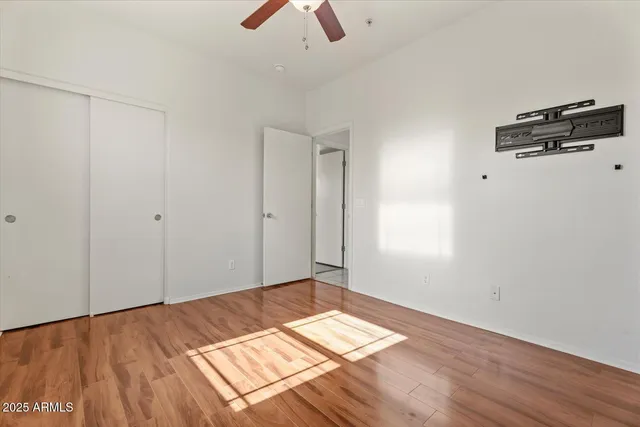 a bathroom with a sink toilet and a mirror