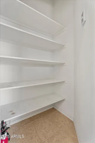 a view of a storage & utility room with toys