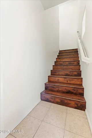 a front view of a house with garage