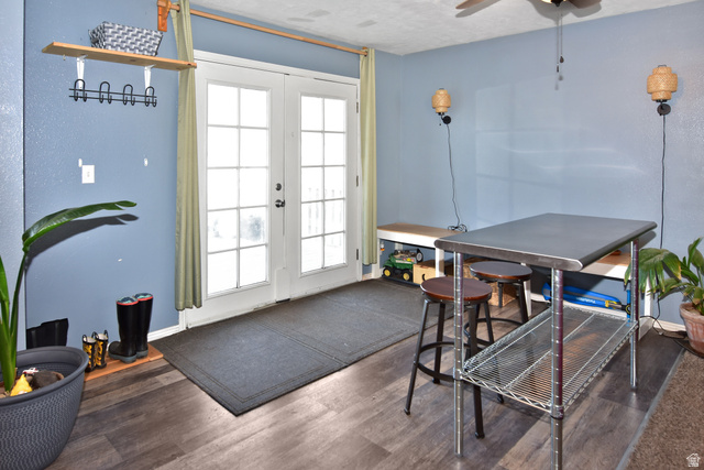 315 Park Street Inkom, ID 83245 - Photo 10 of 28 French doors with divided lites, dark wood-finish flooring, and built-in wall bench