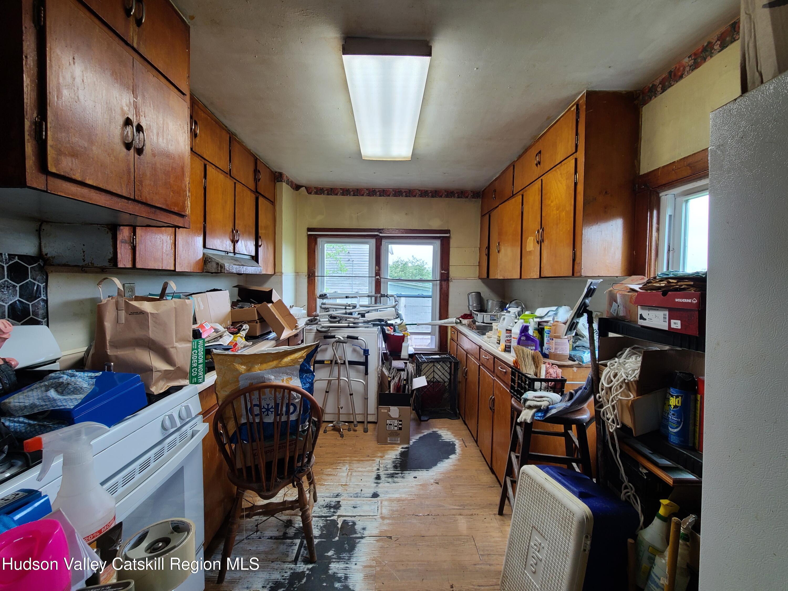 301 Stump Pond Road Livingston Manor, NY 12758 - Photo 12 of 49 a view of a dining room with furniture and a window