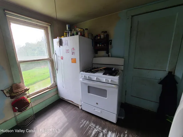 a room with furniture and a window