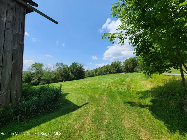 a view of an outdoor space and a yard