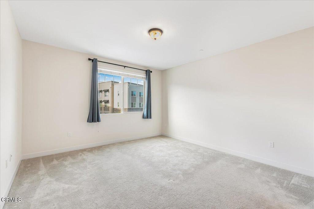 2830 Wagon Wheel Road, Unit 304 Oxnard, CA 93036 - Photo 14 of 44 a view of an empty room with a window