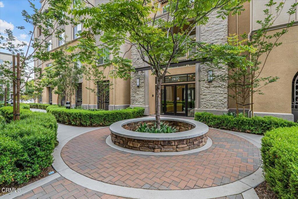 2830 Wagon Wheel Road, Unit 304 Oxnard, CA 93036 - Photo 35 of 44 a view of a house with garden