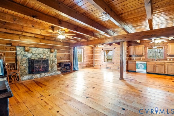 2371 Cedar Bend Road Appomattox, VA 24522 - Photo 11 of 50 a view of a hall with wooden floor and a fireplace