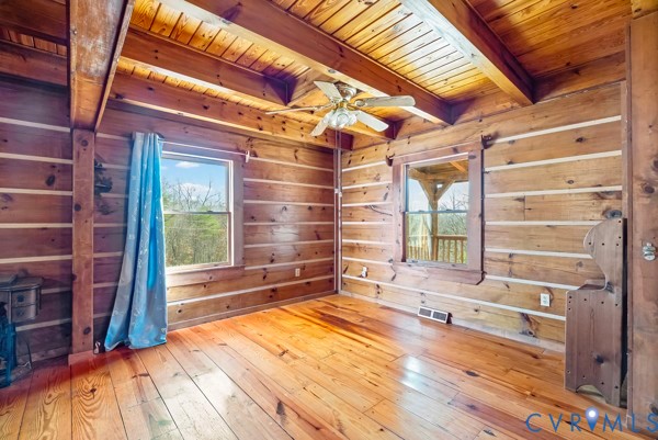 2371 Cedar Bend Road Appomattox, VA 24522 - Photo 14 of 50 a view of empty room with wooden floor and fan