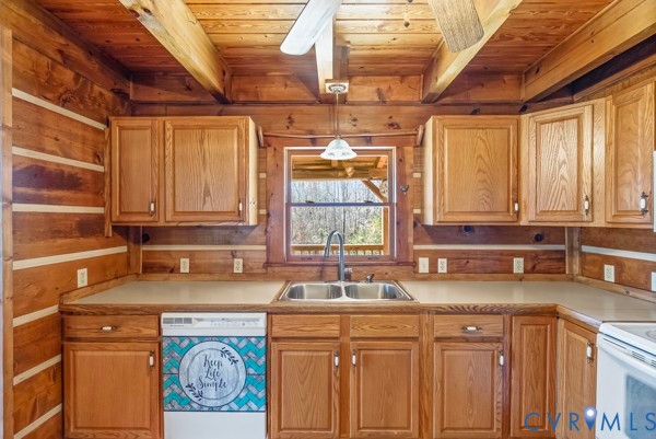 2371 Cedar Bend Road Appomattox, VA 24522 - Photo 16 of 50 a kitchen with stainless steel appliances granite countertop a sink a stove and cabinets