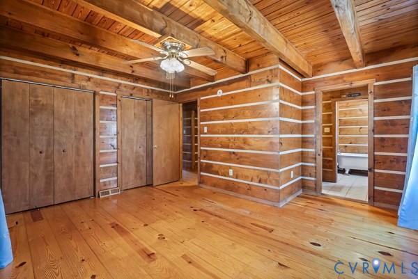 2371 Cedar Bend Road Appomattox, VA 24522 - Photo 23 of 50 a view of an empty room with wooden floor and a window