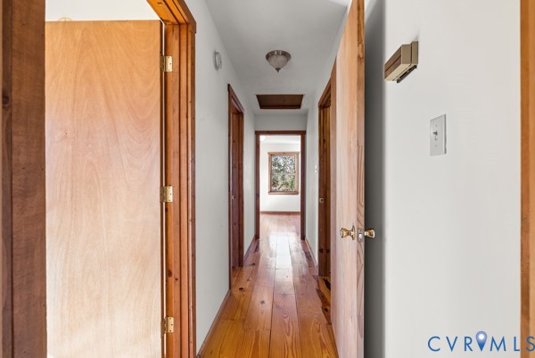 2371 Cedar Bend Road Appomattox, VA 24522 - Photo 26 of 50 a view of a hallway with wooden floor and closet