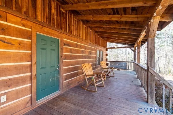 a view of outdoor space with wooden deck