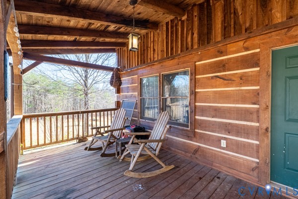 2371 Cedar Bend Road Appomattox, VA 24522 - Photo 5 of 50 a view of a chairs and table on the wooden floor