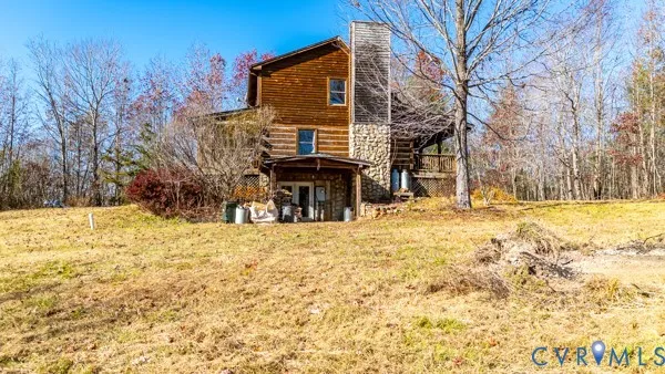 a view of house with snow on the road