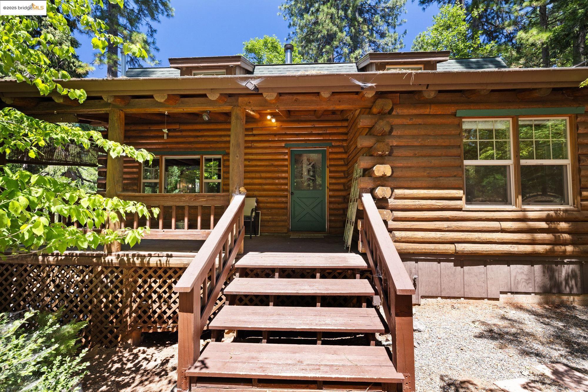 17094 Broken Pine Road Sonora, CA 95370 - Photo 1 of 1 front view of a house with a yard