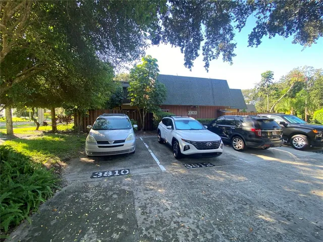 a car parked in front of a house