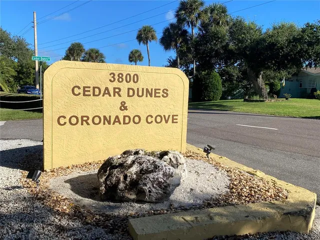 a sign on the side of a road