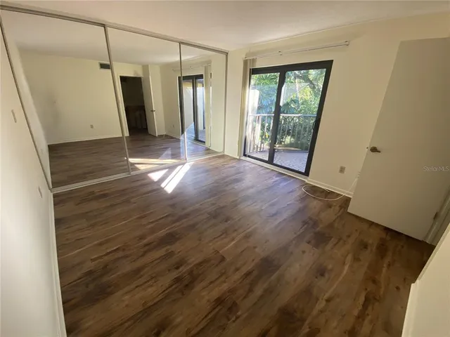 a view of entryway with wooden floor