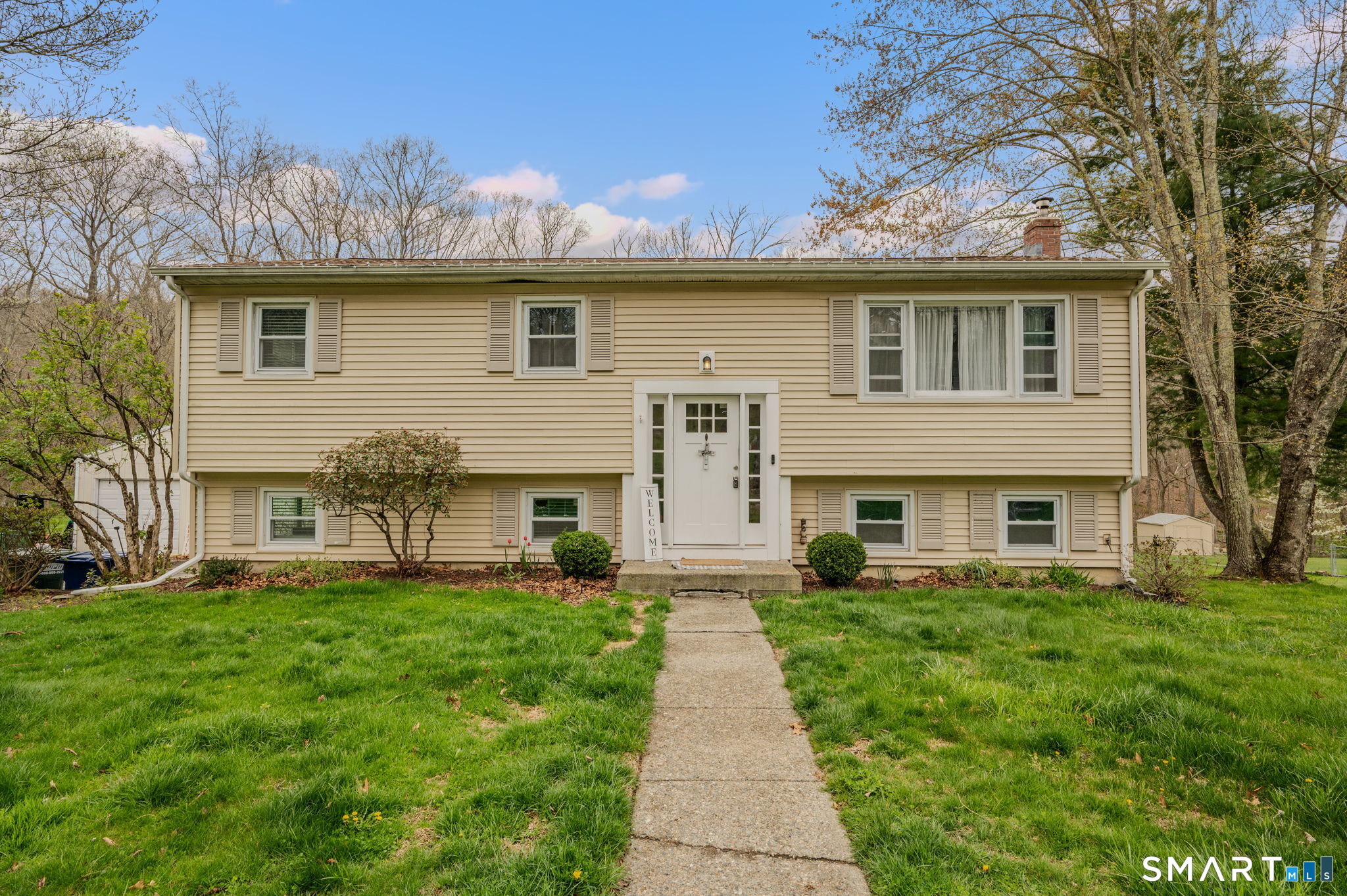 20 Willow Lane Ledyard, CT 06339 - Photo 1 of 21 a front view of a house with a yard