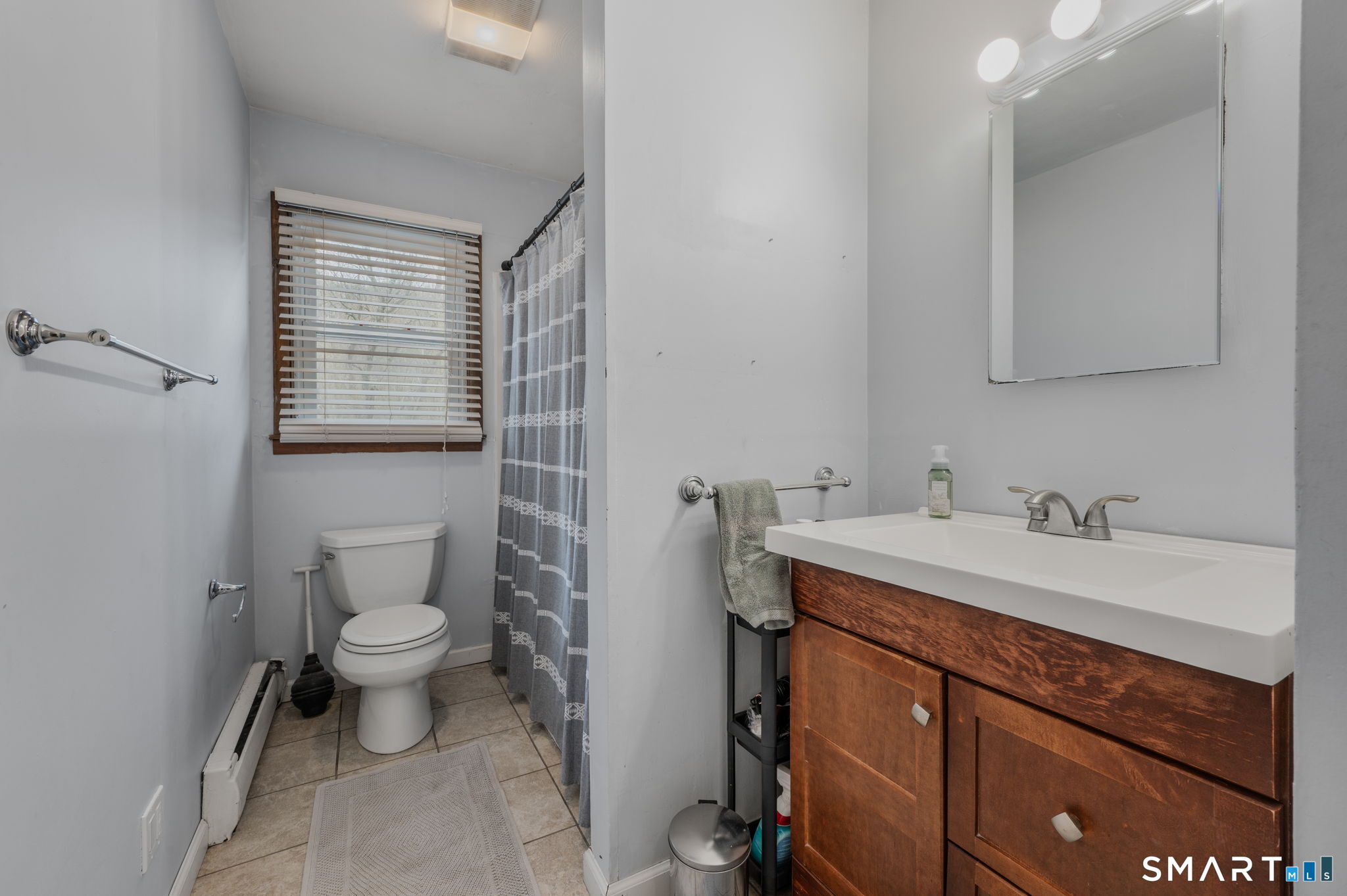 20 Willow Lane Ledyard, CT 06339 - Photo 11 of 21 a bathroom with a sink toilet and vanity