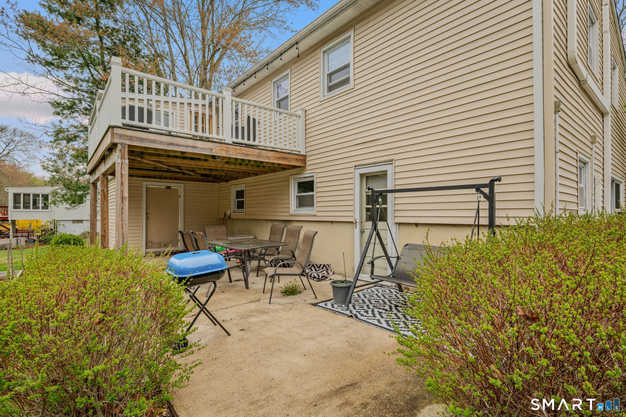 20 Willow Lane Ledyard, CT 06339 - Photo 21 of 21 a view of a chair and table in backyard of the house