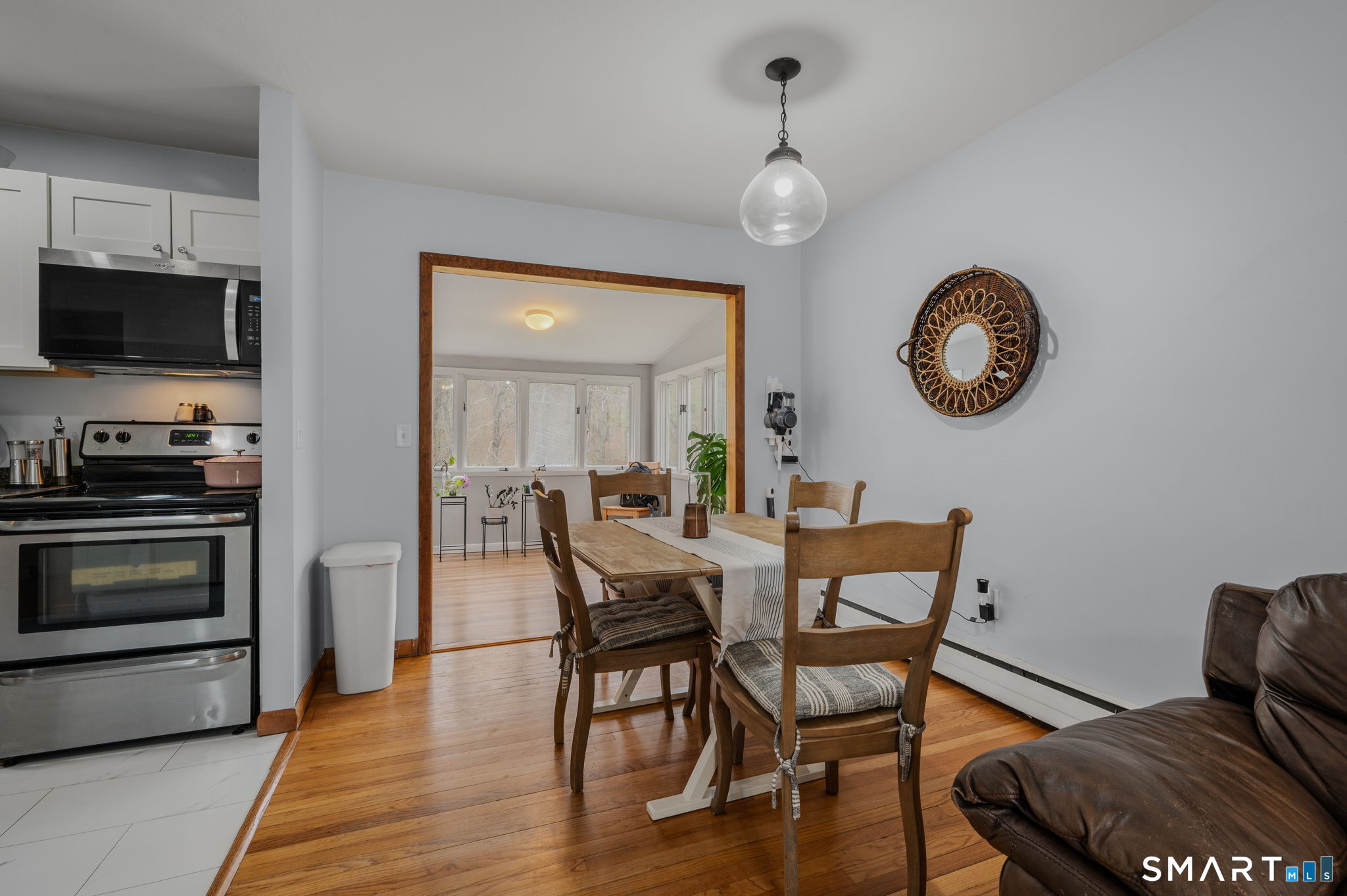 20 Willow Lane Ledyard, CT 06339 - Photo 5 of 21 a view of a dining room with furniture and wooden floor