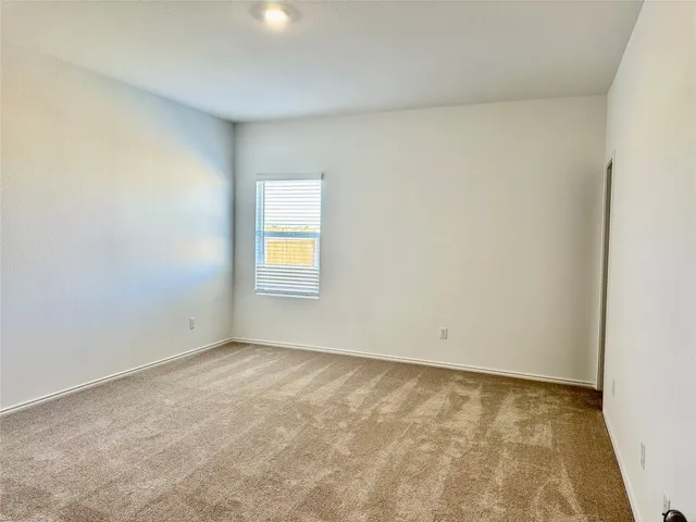 a kitchen that has a sink and a stove