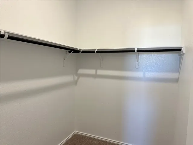 a bathroom with a sink toilet a mirror and shower