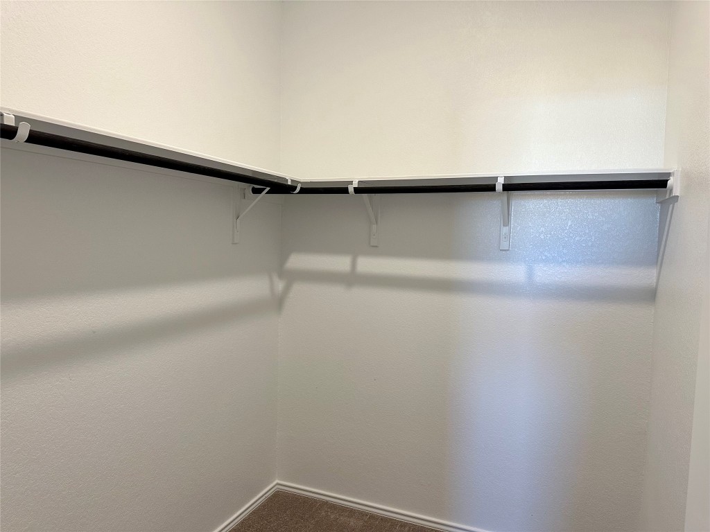 345 The Bad Way Jarrell, TX 76537 - Photo 12 of 34 a close up view of racks on the wall